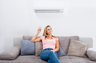 Woman sitting under AC